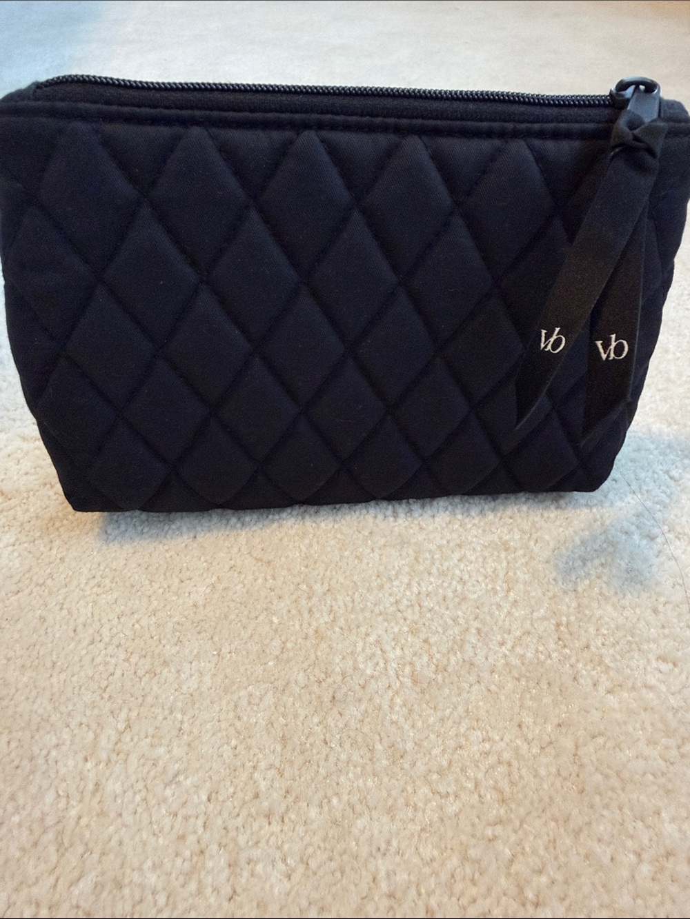 Vera Bradley Essential Small Black Quilted Cosmetic Pouch with Ribbon Pull.